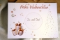 Preview: Nahaufnahme der Weihnachtskarte mit „Frohe Weihnachten“ und goldenem Rubbelbereich für individuelle Botschaften.